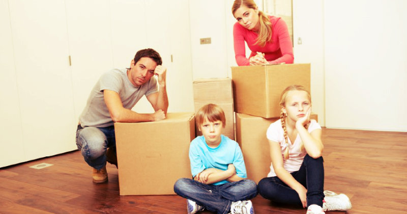 a family of four extremely stressed because of a move