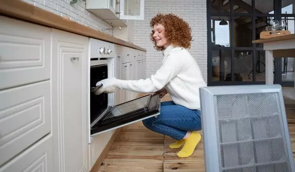 woman preparing a washer for a move
